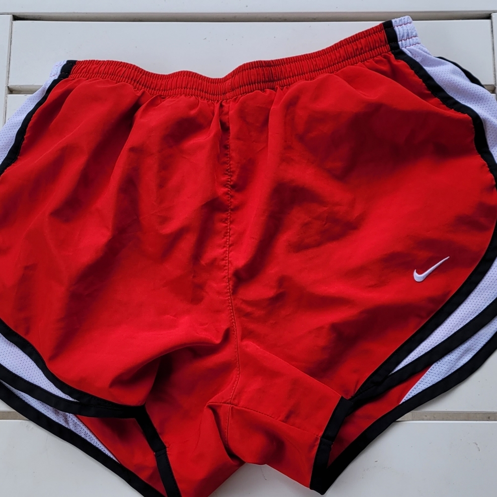 Red Nike shorts